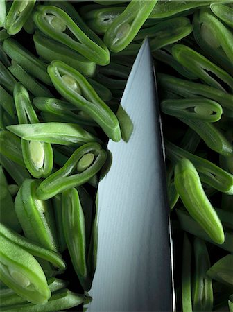 simsearch:659-07597340,k - The tip of a knife with sliced green Stock Photo - Premium Royalty-Free, Code: 659-08905753