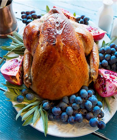 simsearch:659-06902575,k - Roast turkey with grapes, pomegranate and sage Stock Photo - Premium Royalty-Free, Code: 659-08905927