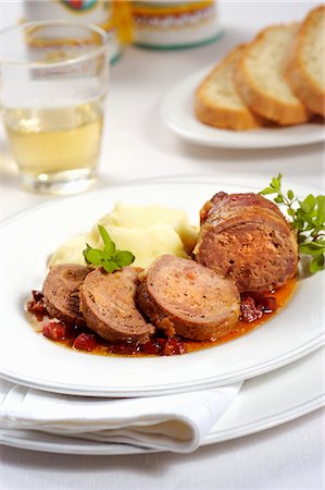 Veal roulade wrapped in prosciutto and served with potato purée Stock Photo - Premium Royalty-Free, Code: 659-08906151