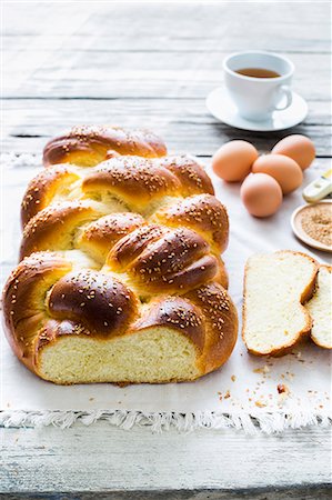 Challah (a Jewish sweet bread plait) with ingredients and coffee Stock Photo - Premium Royalty-Free, Code: 659-08906209