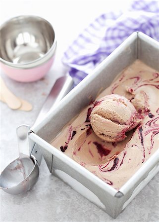fruit ice cream - An ice cream tub with milk chocolate & blackberry ripple ice cream Stock Photo - Premium Royalty-Free, Code: 659-08906344