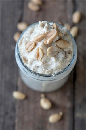 peanut butter - Peanut butter in a glass jar Stock Photo - Premium Royalty-Free, Code: 659-08906446