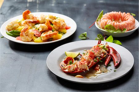 simsearch:659-08940877,k - Three crustacean dishes: prawns with fruit, a ring of prawns and lobster Stock Photo - Premium Royalty-Free, Code: 659-08906467