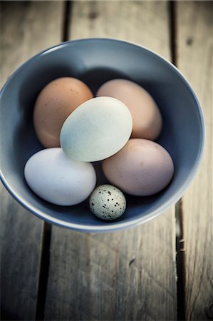 egg still life - Chicken eggs and a quail's egg Stock Photo - Premium Royalty-Free, Code: 659-08902450