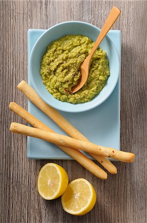 Guacamole, grissini and lemons Stock Photo - Premium Royalty-Free, Code: 659-08902505