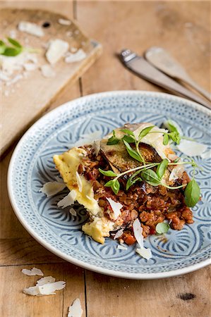 serving casserole - A portion on lentil mousaka Stock Photo - Premium Royalty-Free, Code: 659-08902566