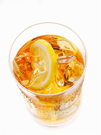 drinking glass studio shot - Iced tea with lemon Stock Photo - Premium Royalty-Free, Code: 659-08902605
