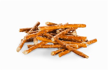 simsearch:659-06902355,k - A pile of pretzel sticks on a white surface Stockbilder - Premium RF Lizenzfrei, Bildnummer: 659-08902716