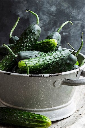 pickling gherkin - Freshly washed country cucumbers in a colander Stock Photo - Premium Royalty-Free, Code: 659-08902855