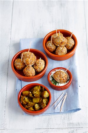Oven-baked pork meatballs with carrots and buckwheat, jalapeños and a yoghurt and mint dip Stock Photo - Premium Royalty-Free, Code: 659-08902904