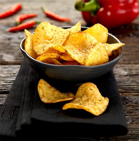 A bowl of chilli crisps Stock Photo - Premium Royalty-Free, Code: 659-08902953