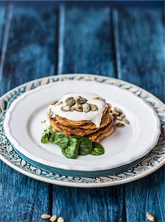 simsearch:659-03531927,k - Gluten-free pumpkin pancakes with quince and pumpkin seeds Stock Photo - Premium Royalty-Free, Code: 659-08903534