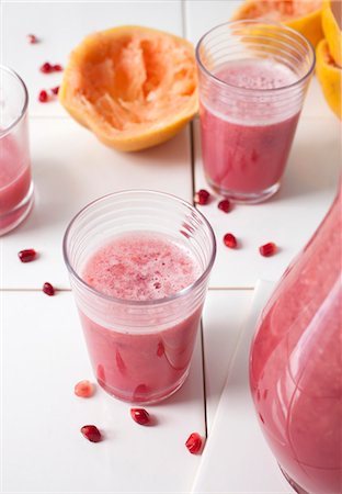 simsearch:659-08147293,k - Glasses of freshly pressed grapefruit and pomegranate juice Stock Photo - Premium Royalty-Free, Code: 659-08903583