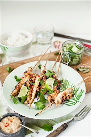 satay - Satay skewers with coriander and limes (Asia) Stock Photo - Premium Royalty-Free, Code: 659-08903665