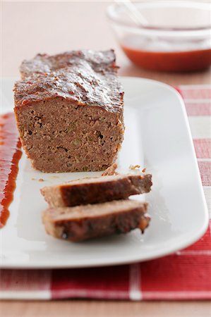 Meatloaf with a red gravy Stock Photo - Premium Royalty-Free, Code: 659-08903834