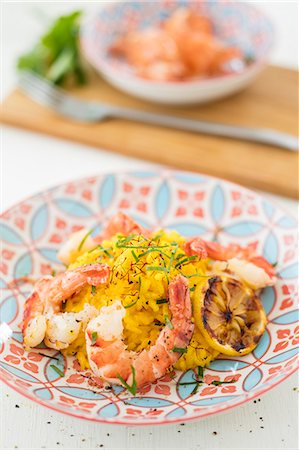 seafood risotto - Saffron risotto with prawns Stock Photo - Premium Royalty-Free, Code: 659-08903913