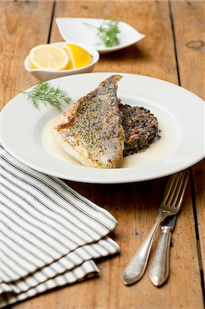 dillweed - Zander fillet on a lentil medley with lemons Stock Photo - Premium Royalty-Free, Code: 659-08903945