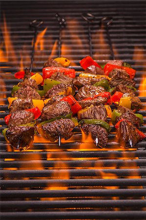 Beef skewers with peppers on a flaming grill Stock Photo - Premium Royalty-Free, Code: 659-08939893