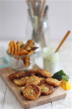 simsearch:659-08513144,k - Breaded courgette fritters with a dip Stock Photo - Premium Royalty-Free, Code: 659-08940346