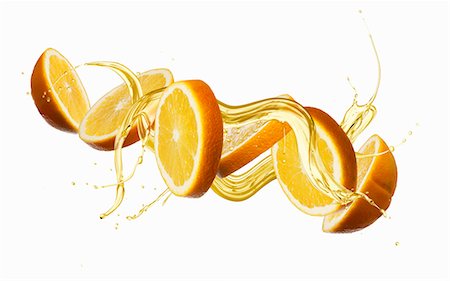 quartier d'orance - Oranges with a splash of oil Photographie de stock - Premium Libres de Droits, Code: 659-08940373