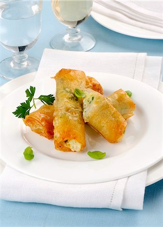 Filo pastry rolls filled with fish Stock Photo - Premium Royalty-Free, Code: 659-08940502