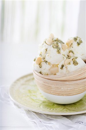 Frozen yoghurt with mint pesto and macadamia nuts Stock Photo - Premium Royalty-Free, Code: 659-08940604