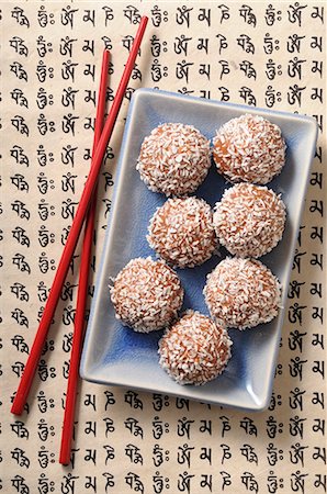 Coconut bites with grated coconut (Asia) Stock Photo - Premium Royalty-Free, Code: 659-08940700