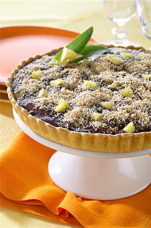 shortcrust pastry base - An exotic tart with dark chocolate cream, pineapple and coconut Stock Photo - Premium Royalty-Free, Code: 659-09124167