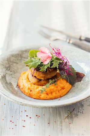 Carrot polenta with mushrooms Stockbilder - Premium RF Lizenzfrei, Bildnummer: 659-09124219