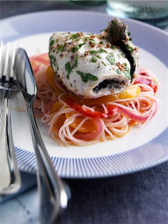 Rolled sea bass on a bed of bell peppers Stock Photo - Premium Royalty-Free, Code: 659-09124504