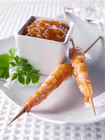 simsearch:659-08906619,k - Mango glazed shrimp canapes Stock Photo - Premium Royalty-Free, Code: 659-09124521