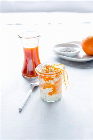 simsearch:659-06671354,k - A dessert made of cream cheese, sea buckthorn syrup, orange fillets, orange zest and chia seeds Stock Photo - Premium Royalty-Free, Code: 659-09124969