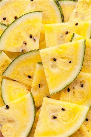 simsearch:659-08905709,k - Pieces of yellow watermelon Stock Photo - Premium Royalty-Free, Code: 659-09125292