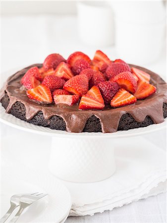 simsearch:659-06900815,k - Vegan flourless chocolate tart with poppy seeds and chocolate Stock Photo - Premium Royalty-Free, Code: 659-09125484