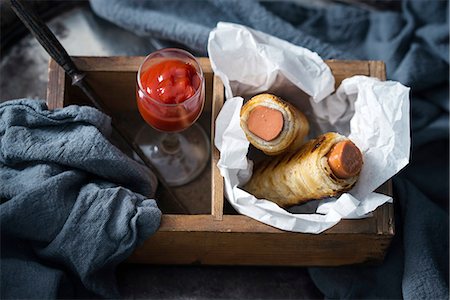 food, dark background - Fried tofu sausage rolls (vegan) Stock Photo - Premium Royalty-Free, Code: 659-09125684