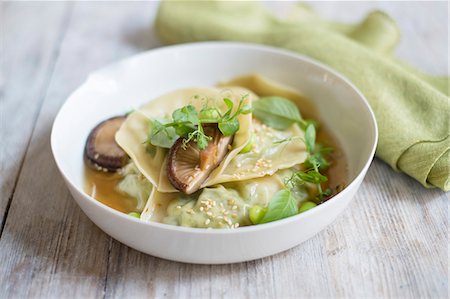 fungus food - Dumplings in broth with edamame, mushrooms and watercress Stock Photo - Premium Royalty-Free, Code: 659-09125864