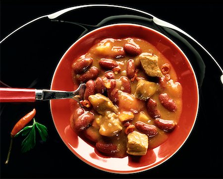 Chili con carne on red plate Foto de stock - Sin royalties Premium, Código: 659-01844075