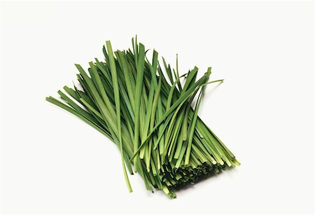 simsearch:659-01844281,k - Fresh ramsons (wild garlic) leaves, cut into strips Fotografie stock - Premium Royalty-Free, Codice: 659-01844288