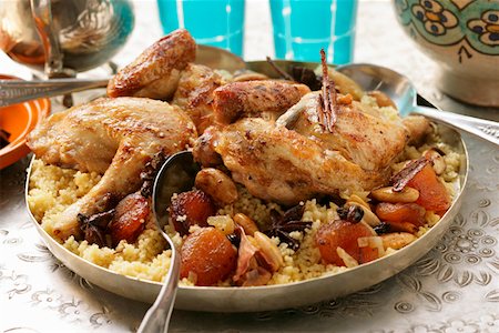 Couscous with chicken, dried fruit, almonds and cinnamon Stock Photo - Premium Royalty-Free, Code: 659-01844457