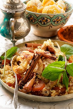 pan fried african - Couscous with chicken, dried fruit, almonds and cinnamon Stock Photo - Premium Royalty-Free, Code: 659-01844459