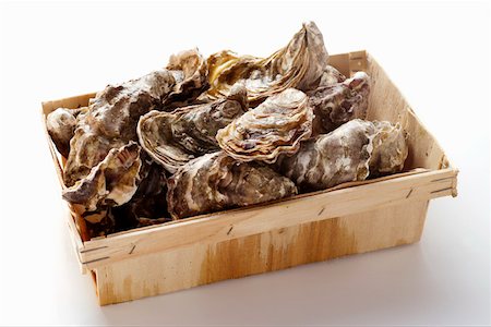 raw oyster - Oysters in a crate Stock Photo - Premium Royalty-Free, Code: 659-01844604