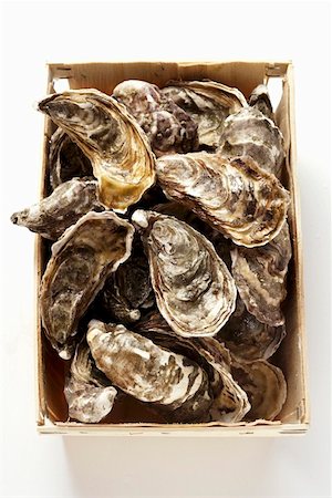 raw oyster - Oysters in a crate Stock Photo - Premium Royalty-Free, Code: 659-01844602