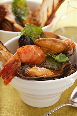 simsearch:659-01853208,k - Fish soup with mussels, shrimps and tomatoes Stock Photo - Premium Royalty-Free, Code: 659-01844732