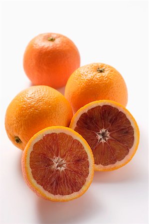 Whole and half blood oranges Stock Photo - Premium Royalty-Free, Code: 659-01844779