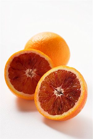 Whole and half blood oranges Stock Photo - Premium Royalty-Free, Code: 659-01844782