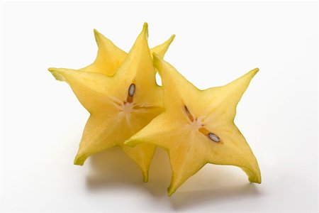 sliced carambola - Tranches de carambole Photographie de stock - Premium Libres de Droits, Code: 659-01844881