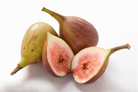 simsearch:659-01843575,k - Three fresh figs, one halved Stock Photo - Premium Royalty-Free, Code: 659-01844896