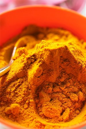 Turmeric in orange bowl Foto de stock - Sin royalties Premium, Código: 659-01844950