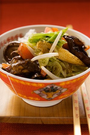 Vegetables and mushrooms cooked in wok on rice (China) Stock Photo - Premium Royalty-Free, Code: 659-01844965