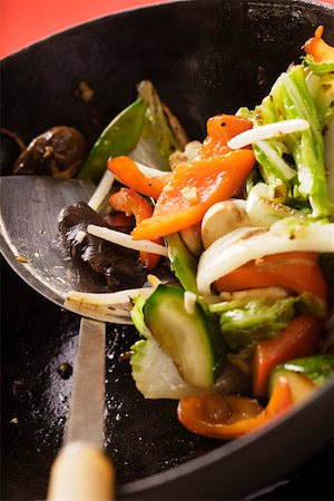 pancake spatula - Asian vegetables with mushrooms in wok Foto de stock - Sin royalties Premium, Código: 659-01844961